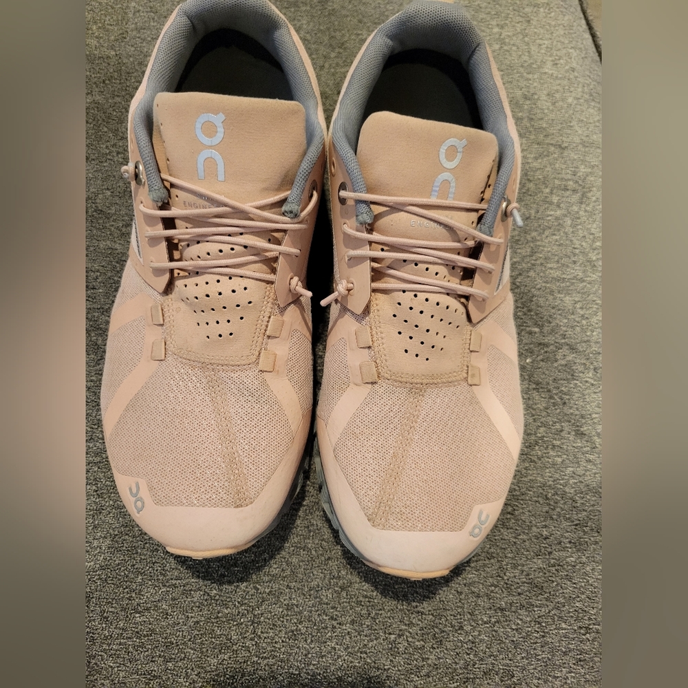 On Light pink and grey shoes